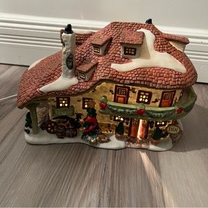This is a Beautiful Christmas Lighted Porcelain House "The Georgian Inn"
